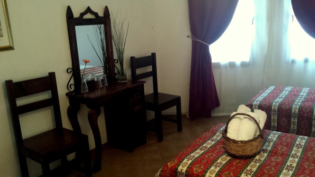 Kilim Hotel Далян Стая снимка