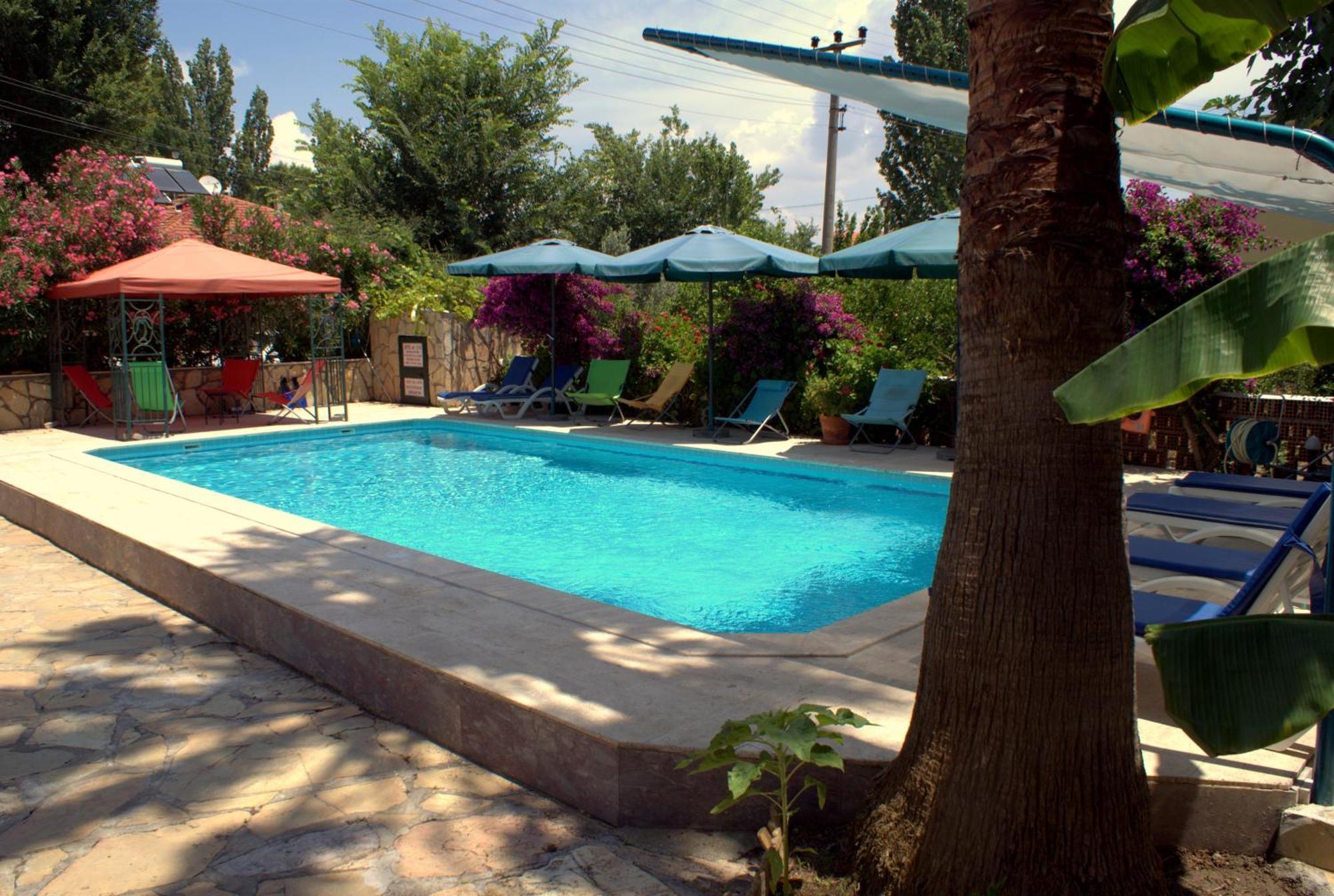 Kilim Hotel Далян Екстериор снимка