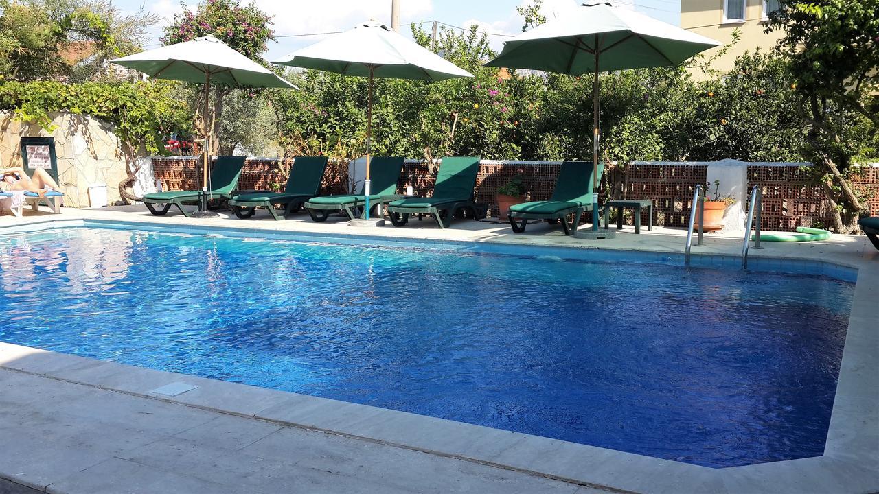 Kilim Hotel Далян Екстериор снимка