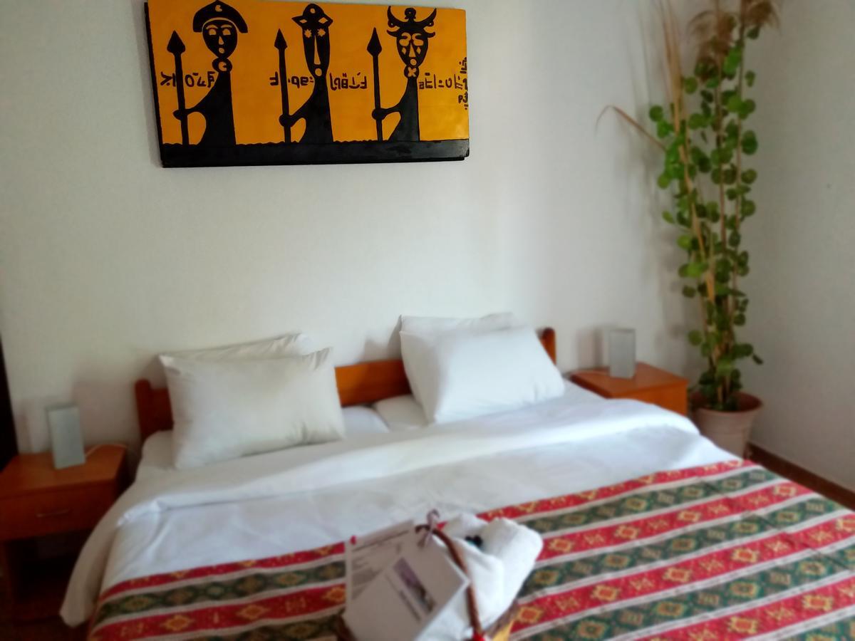 Kilim Hotel Далян Екстериор снимка